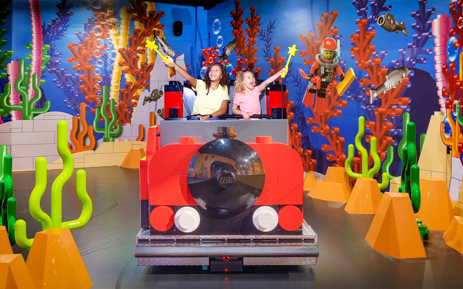 Children enjoying a LEGO submarine ride at LEGO Discovery Centre Hamburg.