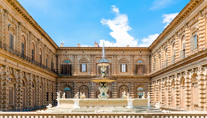 Pitti Palace exterior view in Florence, Italy, showcasing Renaissance architecture.