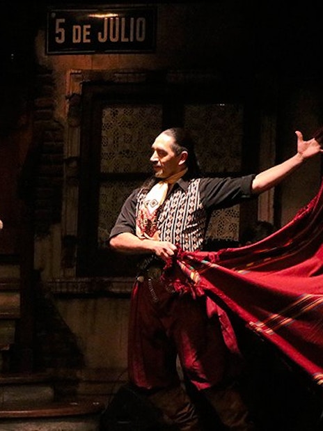 Tango dancers performing at Aljibe Tango Show in Buenos Aires.