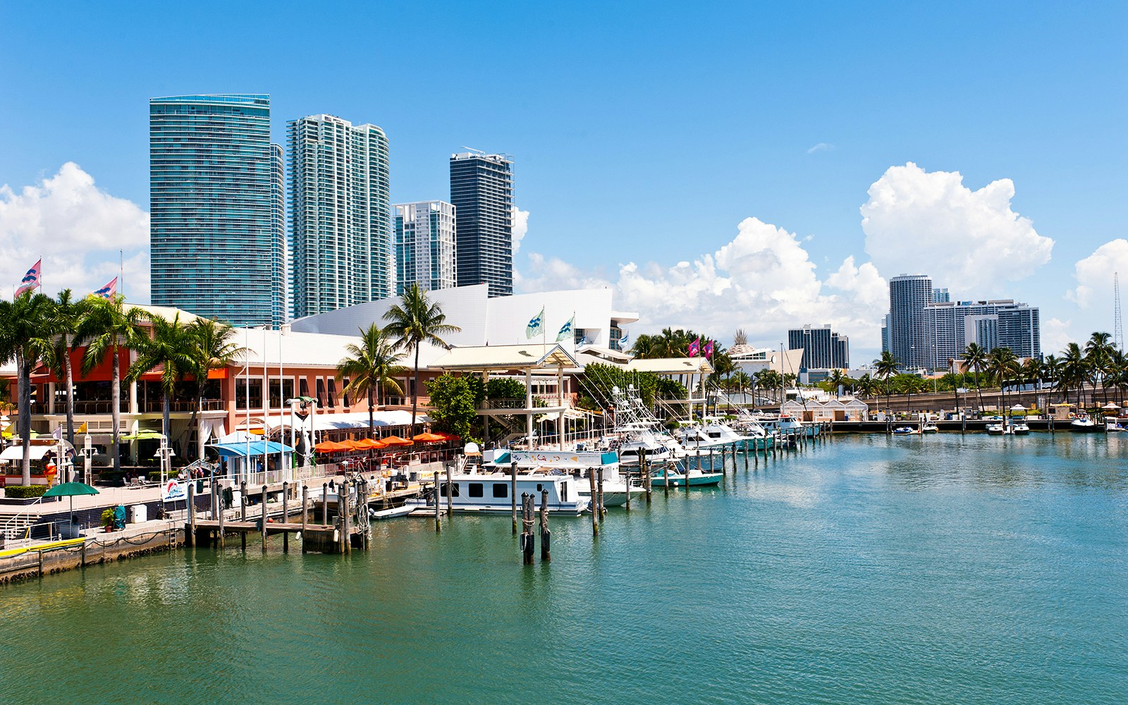 Bayside Marketplace in Miami with boats docked at the marina.