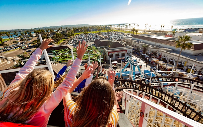 Roller coaster ride at Belmont Park, San Diego, overlooking the ocean and amusement area.