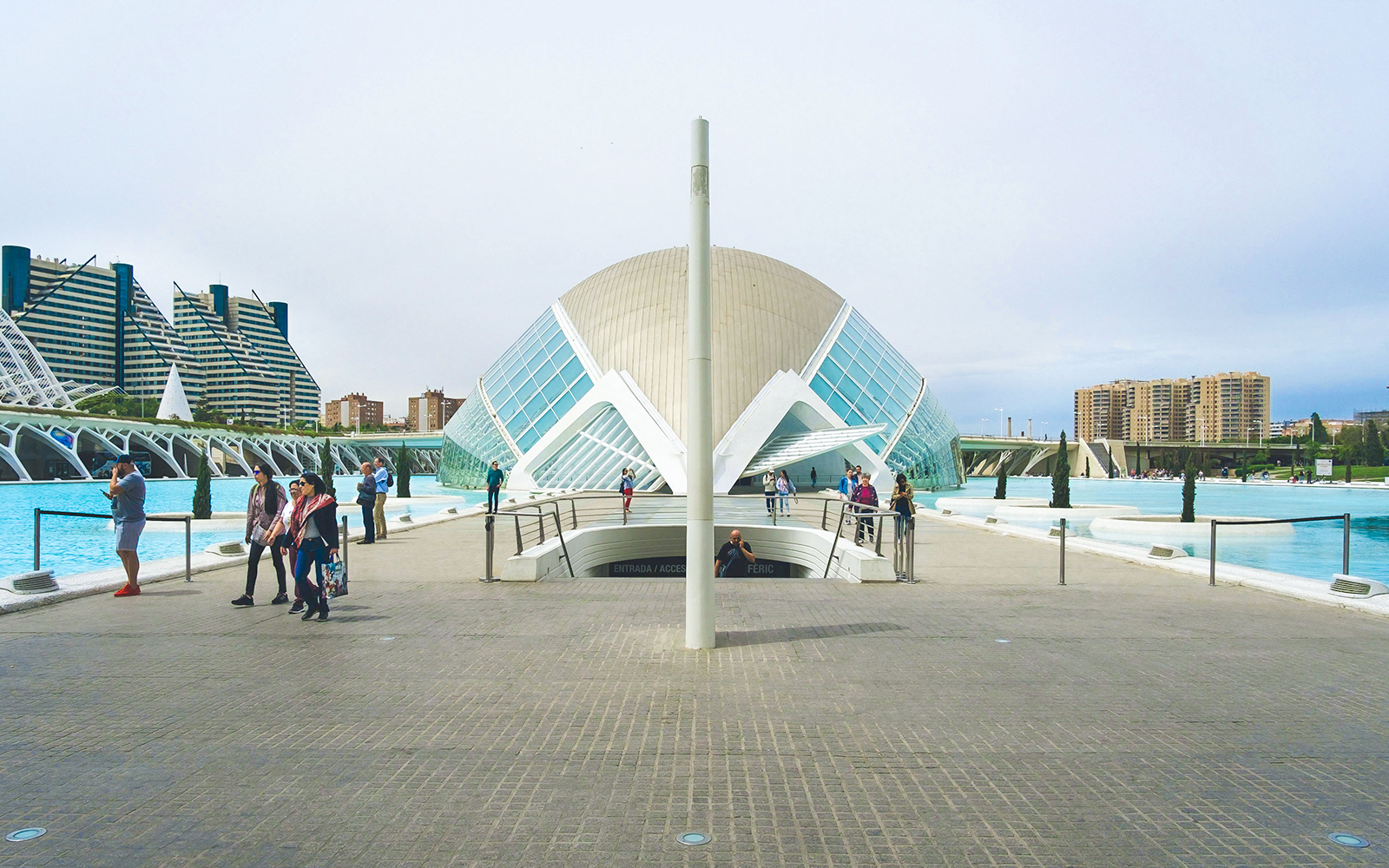 Hemisfèric building with visitors at City of Arts and Sciences, Valencia.