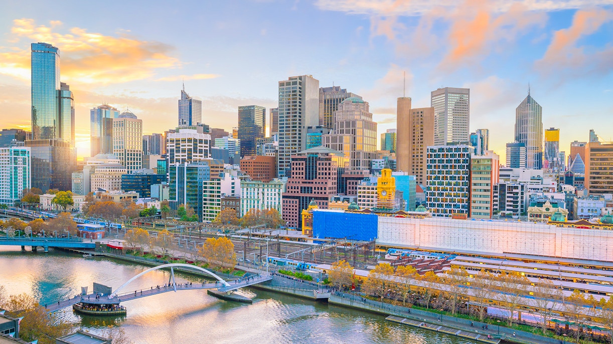Melbourne skyline with Yarra River and Flinders Street Station in view.