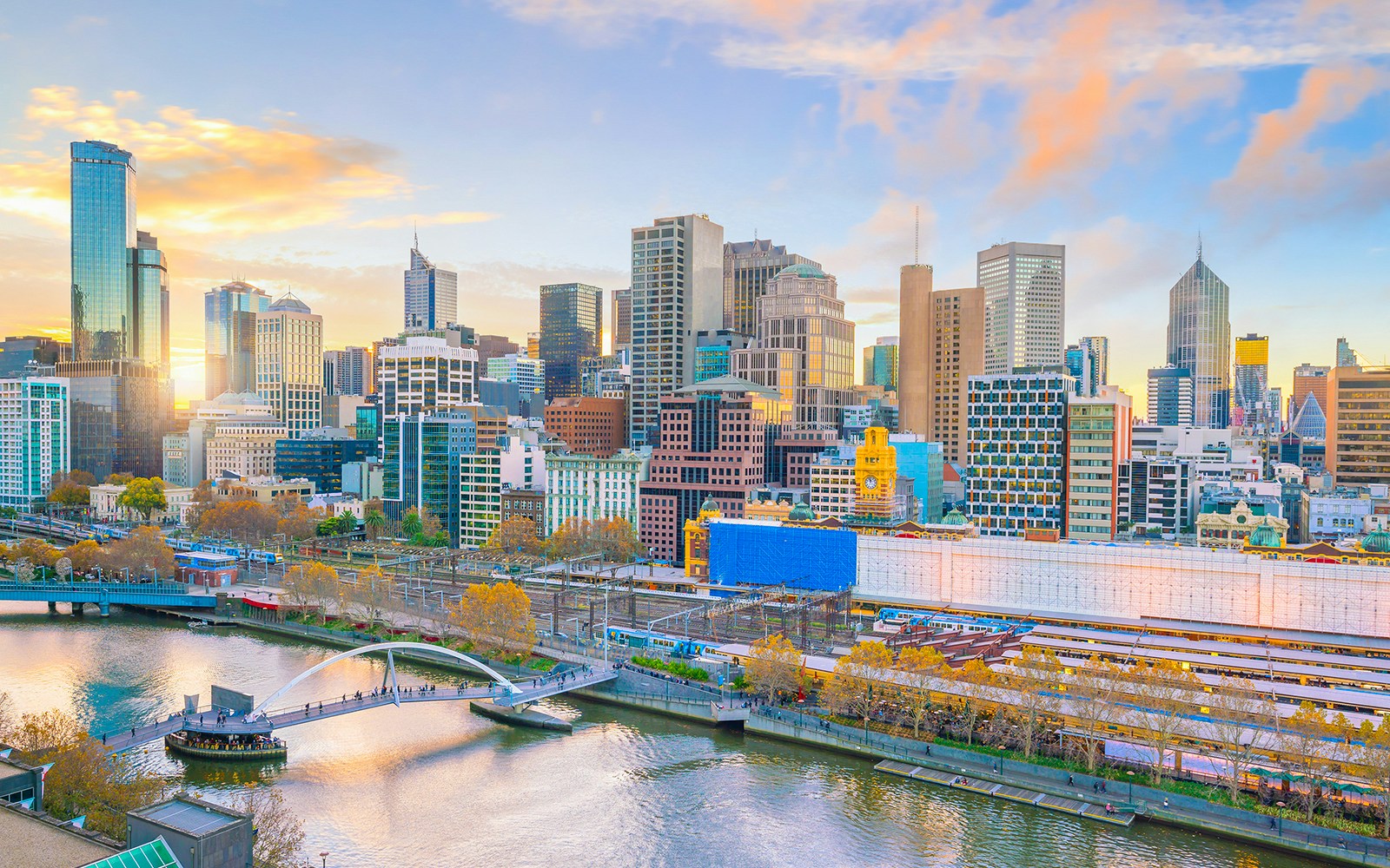 Melbourne skyline view from a floating brunch experience on the Yarra River.