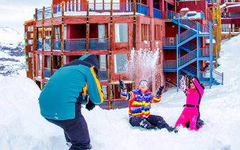 Tourists enjoying a snowball fight at Valle Nevado resort, Santiago.