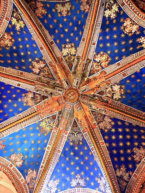 Ceiling artwork inside the Cathedral of Toledo during a guided tour.
