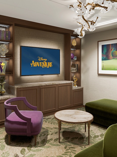 Concierge Suite with oceanview verandah on Disney Adventure Cruise, featuring elegant decor and seating.