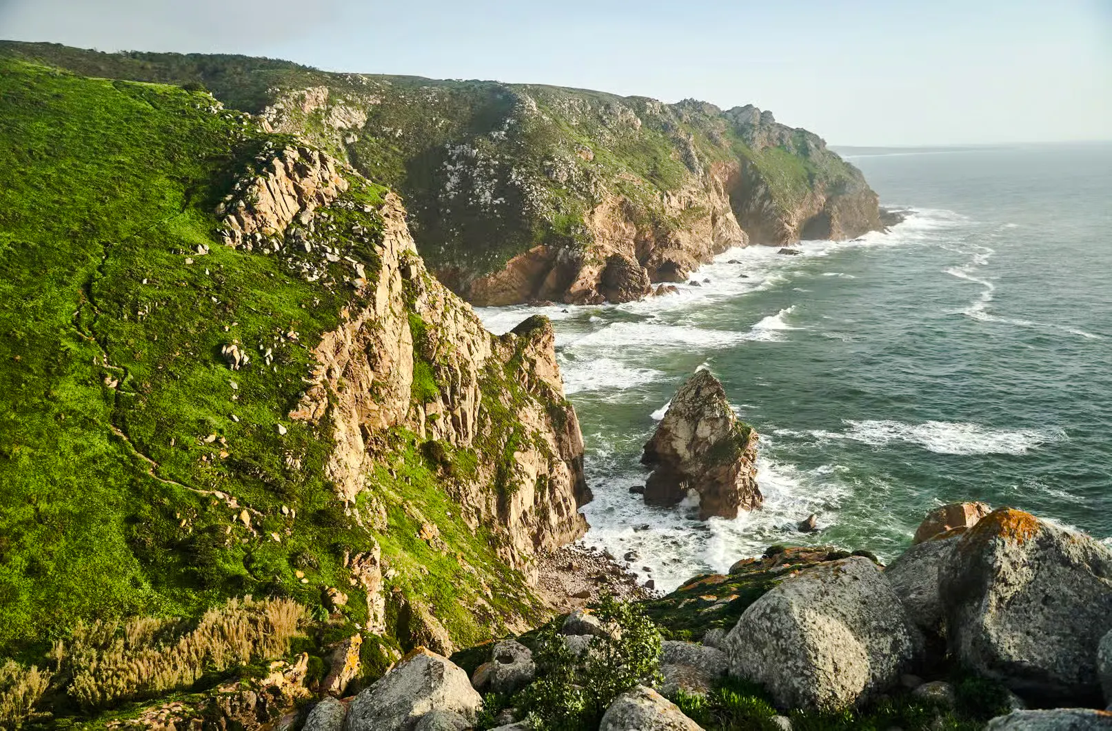 Cabo da Roca cliffs and Atlantic Ocean waves near Sintra, Portugal.