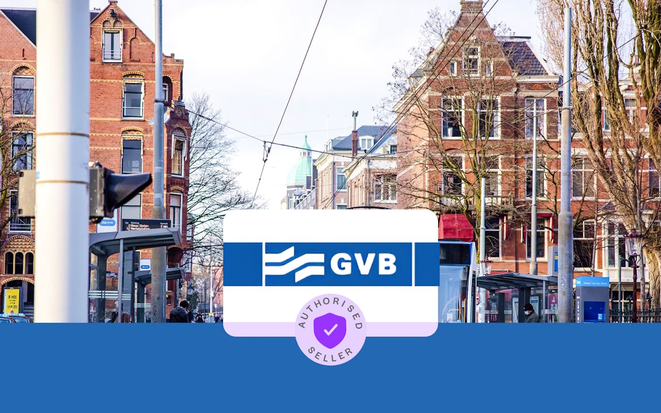 Tram stop in Amsterdam with GVB sign and historic buildings in the background.