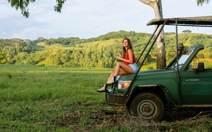 4x4 vehicle in Bel Ombre landscape during safari tour.