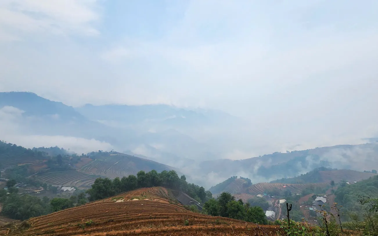 Mu Cang Chai rice terraces and village view during trekking tour.