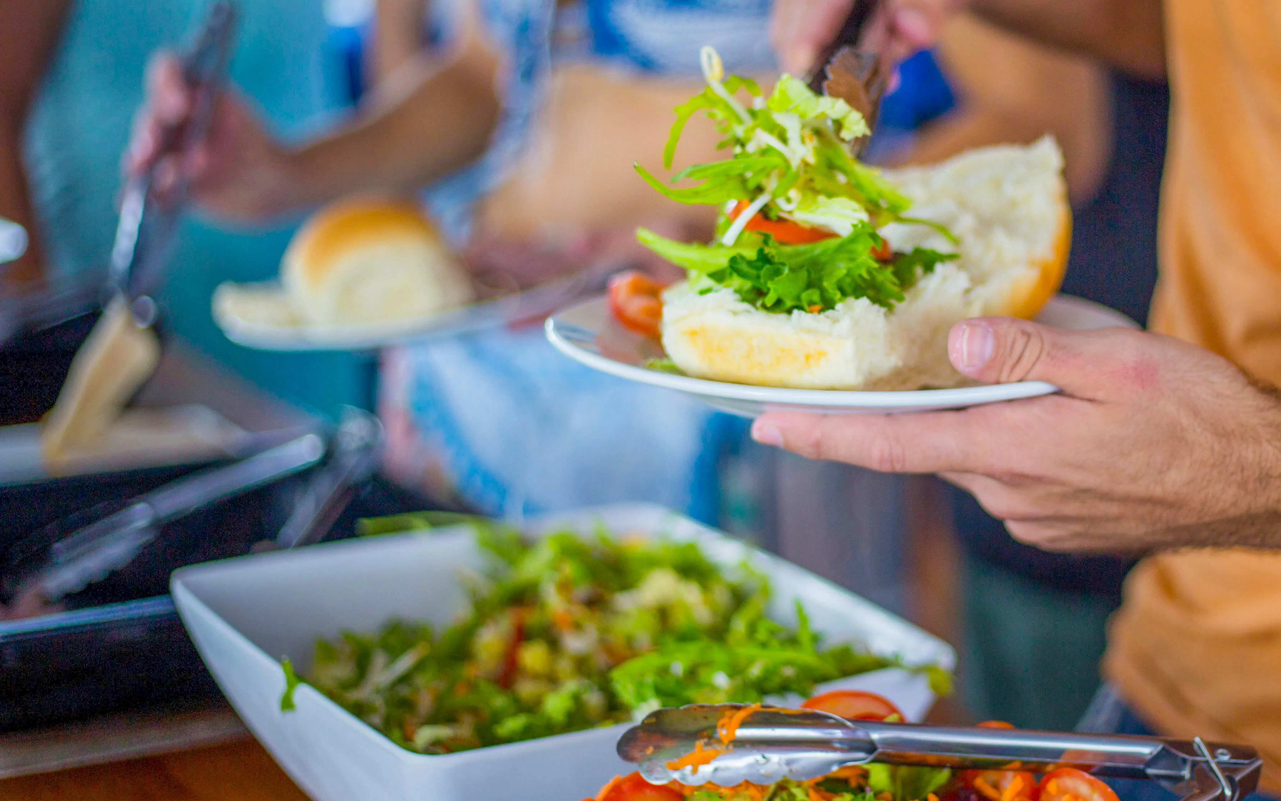 Buffet meal with fresh salad and bread on Divers Den tour.