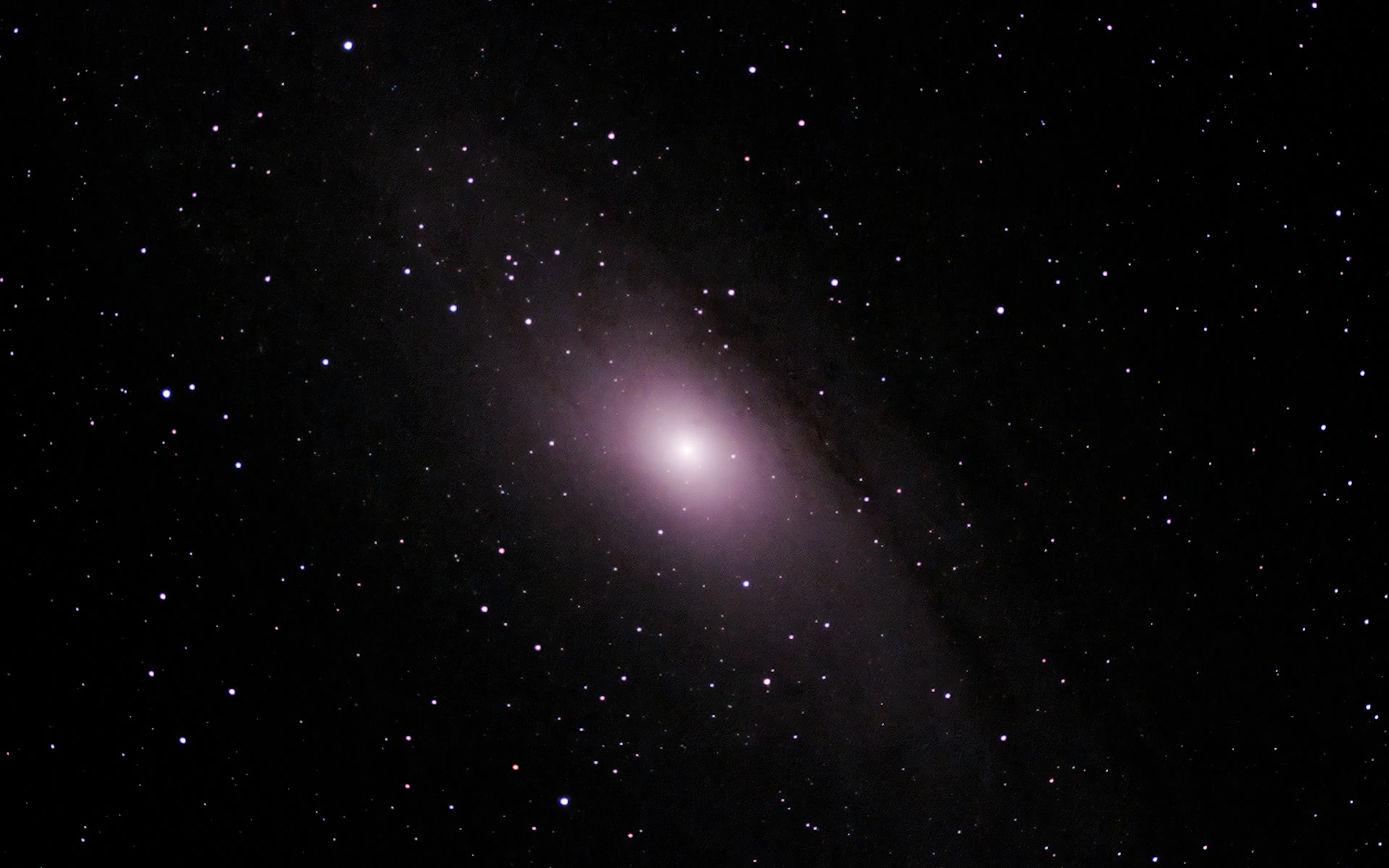Astral view from Mauna Kea Observatory featuring a galaxy surrounded by stars.