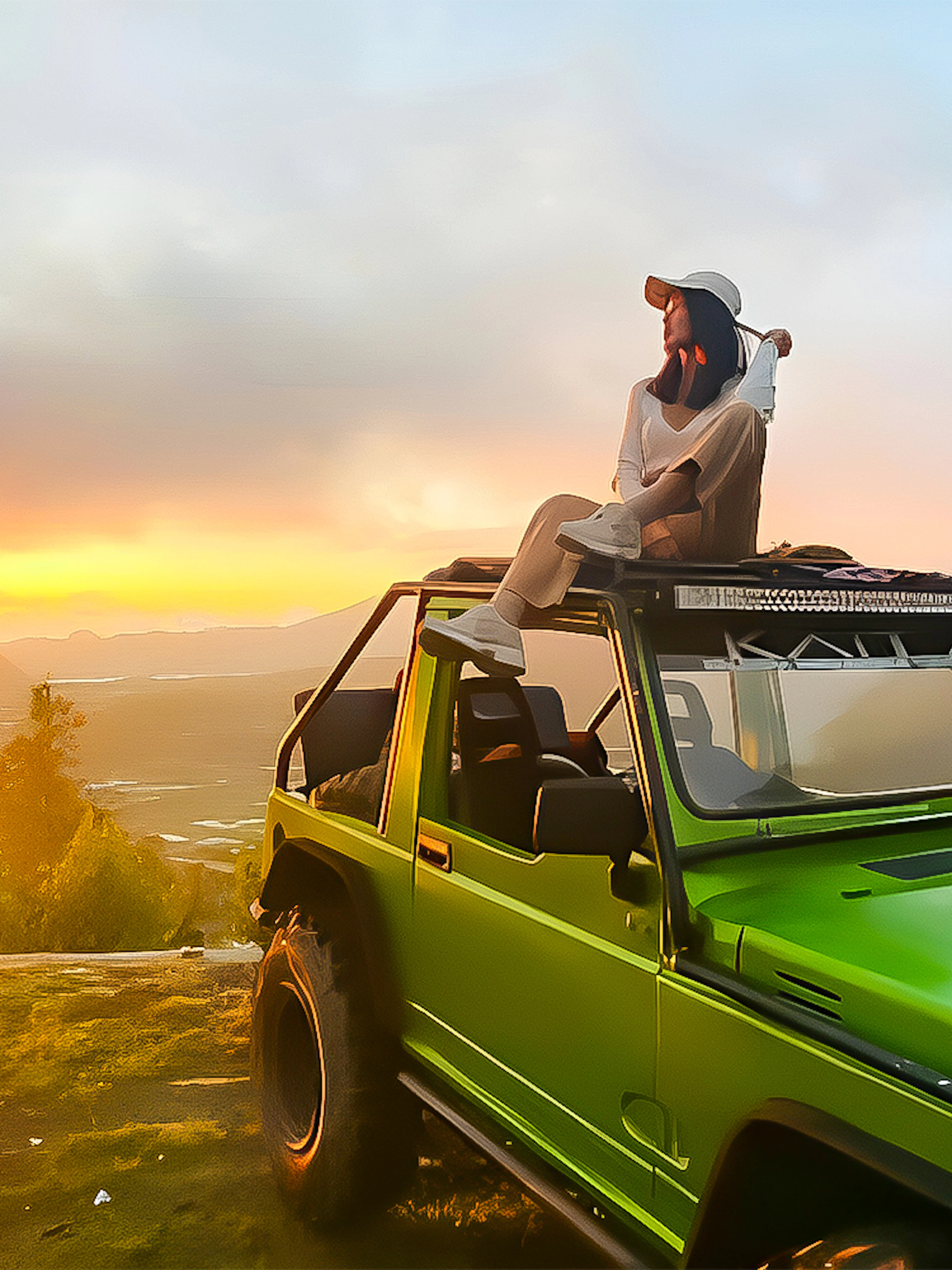 Person sitting on a green jeep at Mount Batur sunrise, Bali.