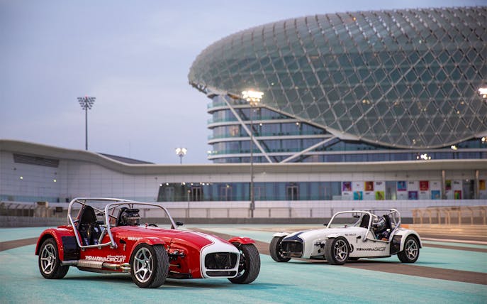 Caterham Seven 360 cars on Yas Marina Circuit track in Abu Dhabi.
