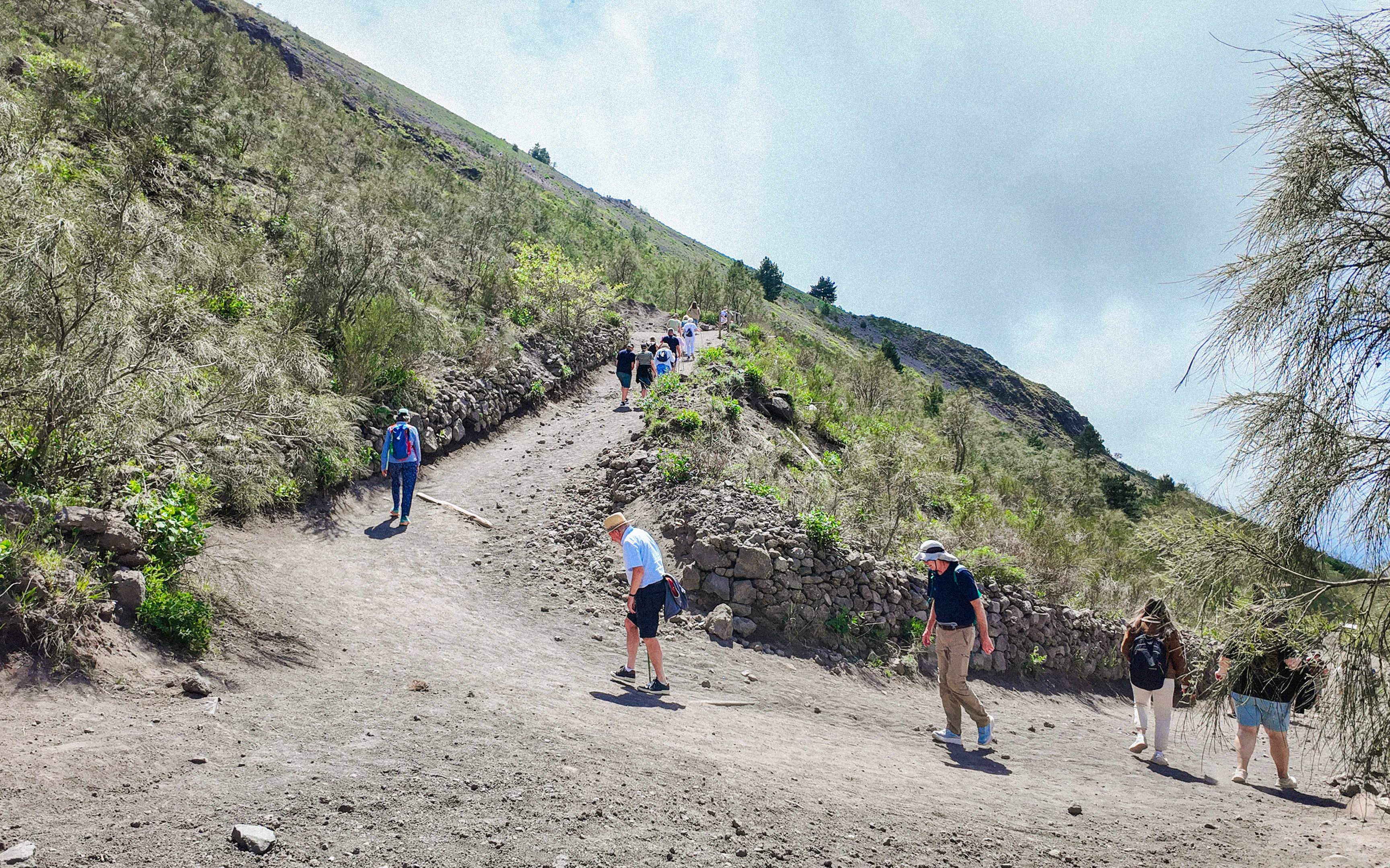 Visitors hiking up the trail on Mount Vesuvius, Italy.