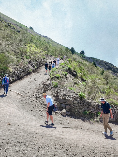 Visitors hiking up the trail on Mount Vesuvius, Italy.