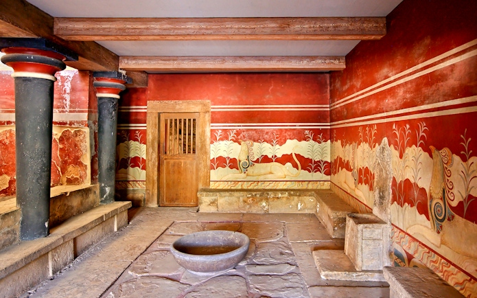 Knossos Palace frescoes and columns, Crete archaeological site.