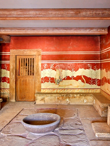 Knossos Palace frescoes and columns, Crete archaeological site.