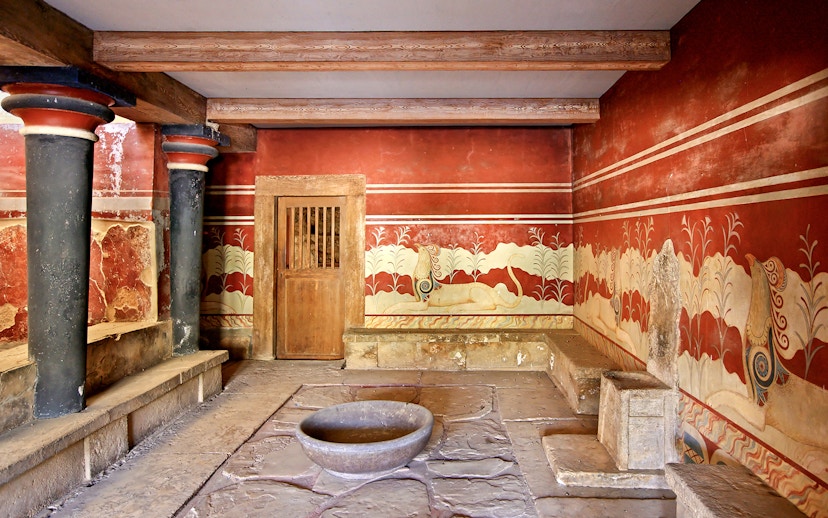 Knossos Palace frescoes and columns, Crete archaeological site.