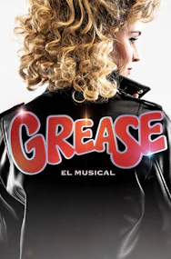 Grease musical cast performing on stage in London theater.