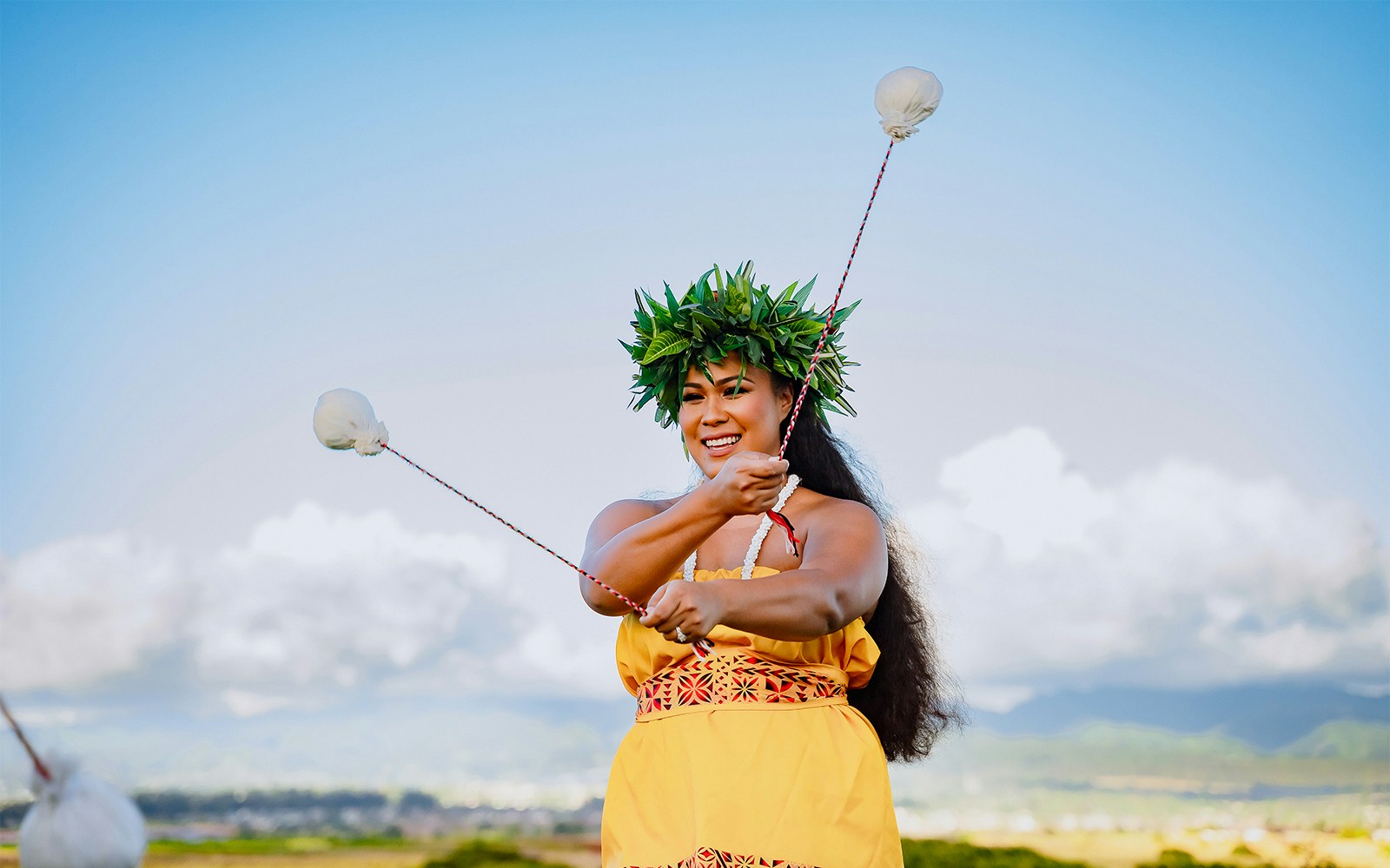 Poi dancer performing at Mauka Warriors event in Hawaii, showcasing traditional Polynesian dance.