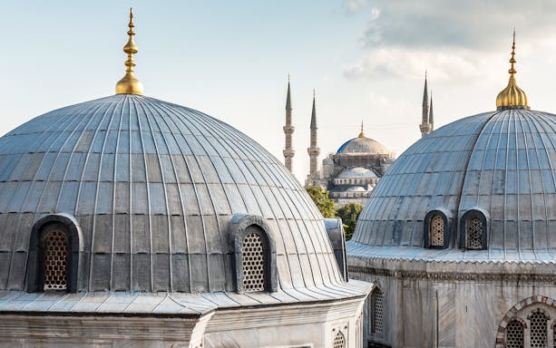 Domes of Hagia Sophia with Blue Mosque in background, Istanbul tour.
