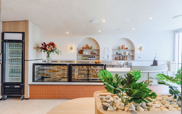 Plaza Premium Lounge with refreshments and seating, International Arrival.