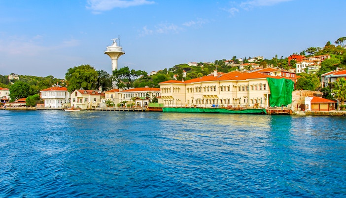 Bosphorus cruise view of Kanlica village with traditional Ottoman architecture.