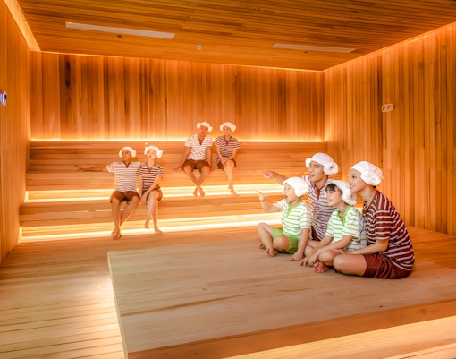 Family enjoying sauna at Aquafield Nha Trang, Vietnam's Korean-style wellness complex.