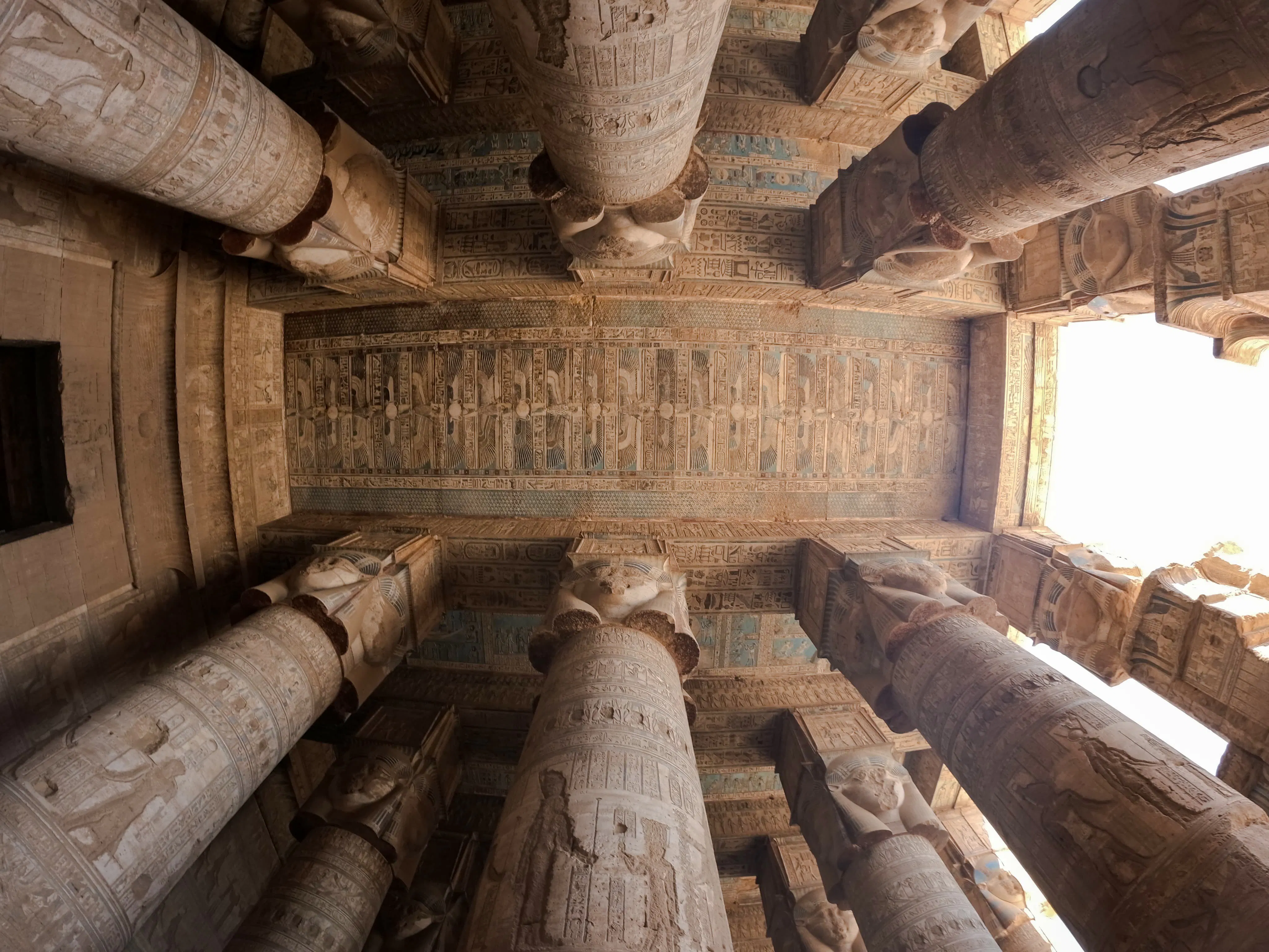 Ancient Egyptian temple columns with hieroglyphics, Aswan, part of Nile Serenade tour.