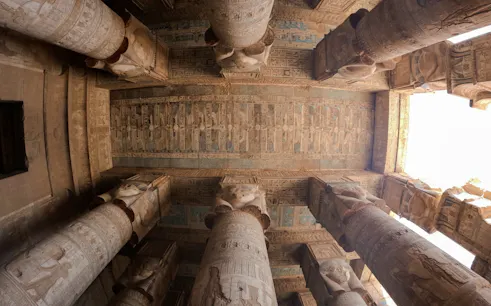 Ancient Egyptian temple columns with hieroglyphics, Aswan, part of Nile Serenade tour.