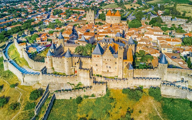 Aerial view of Carcassonne's medieval fortress and surrounding town, France.
