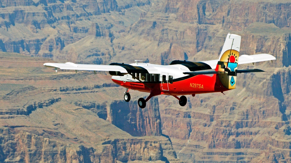 Airplane headed to Grand Canyon on a tour with Helicopter Floor Landing & Pontoon Ride