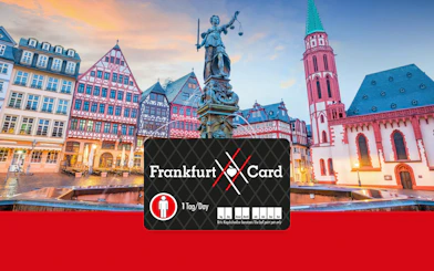 Römerberg square in Frankfurt with historic buildings and Justice Fountain at sunset.