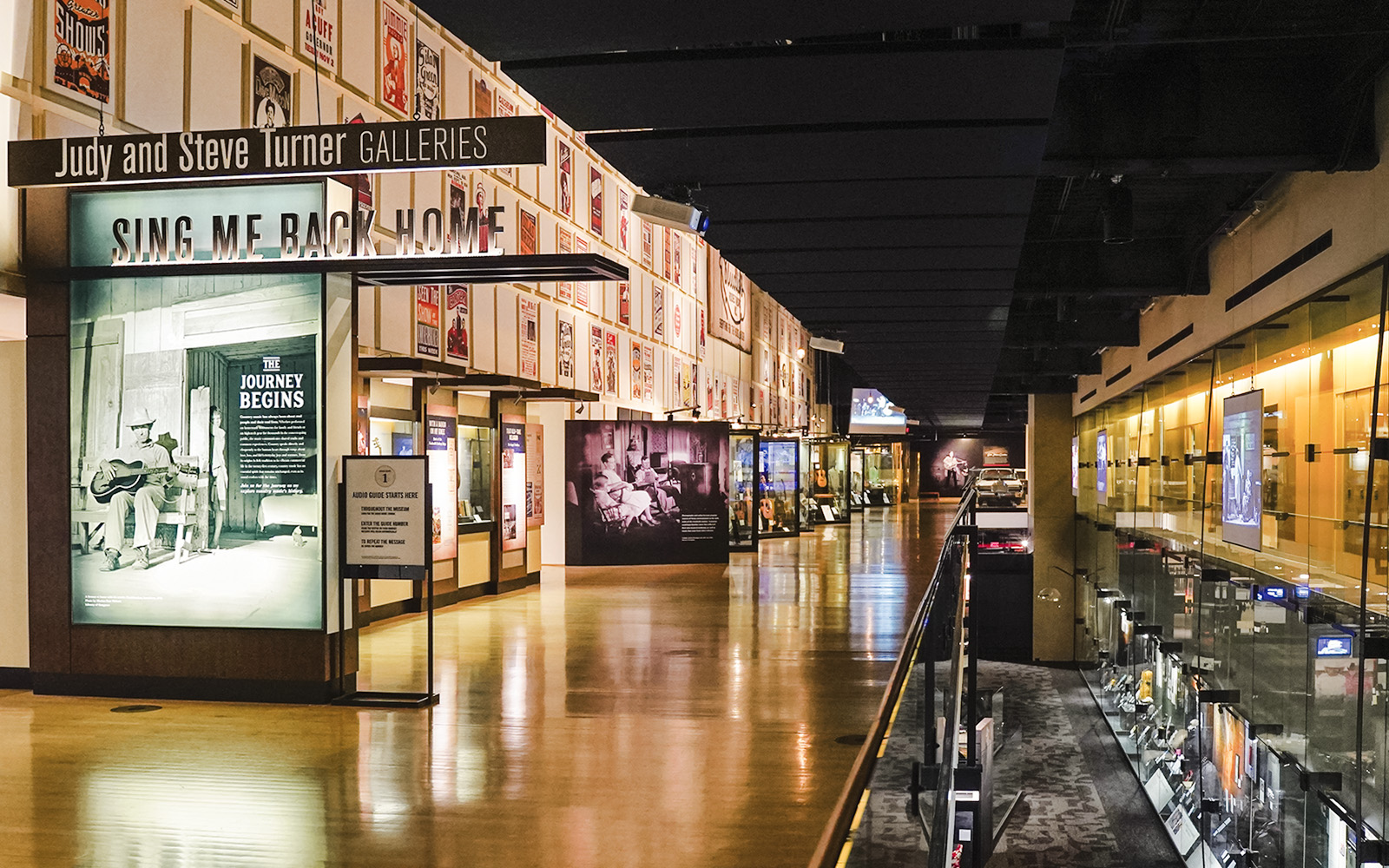 Country Music Hall of Fame gallery with exhibits and posters in Nashville.
