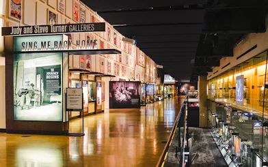 Country Music Hall of Fame gallery with exhibits and posters in Nashville.