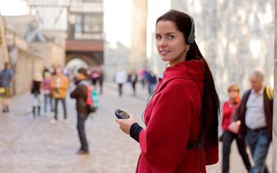 Visitors with audio guides entering the Roman Pantheon, Rome, Italy.