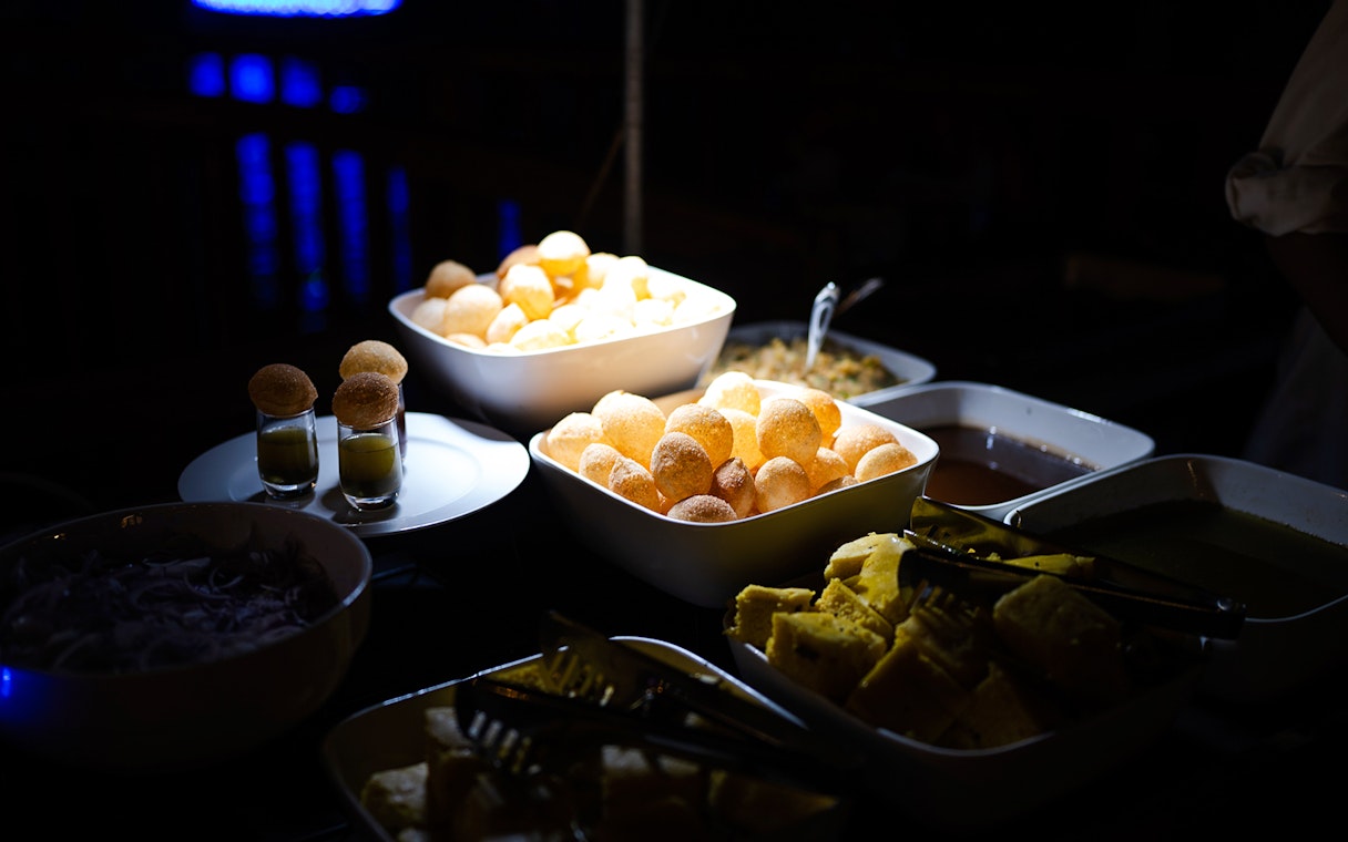 Indian snacks and dishes served on a Dubai Marina luxury dhow cruise.