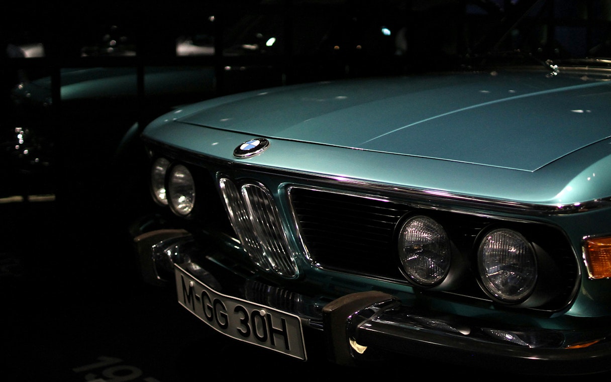Closeup of a vintage BMW car front at the BMW Museum.