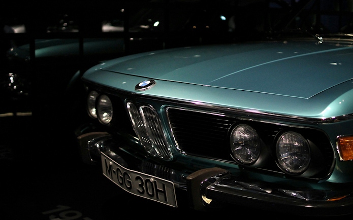 Closeup of a vintage BMW car front at the BMW Museum.