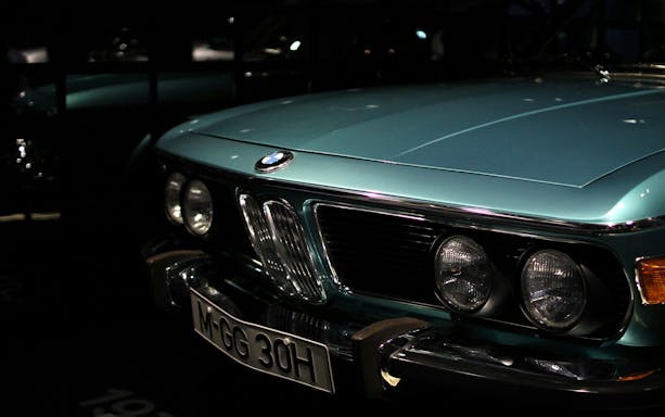 Closeup of a vintage BMW car front at the BMW Museum.
