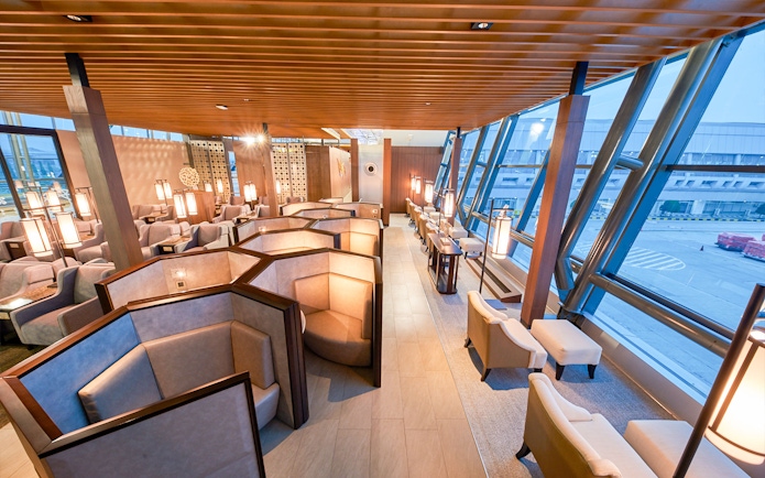 Sapphire Lounge seating area, T3 International Departures, near Gate 7, with airport view.