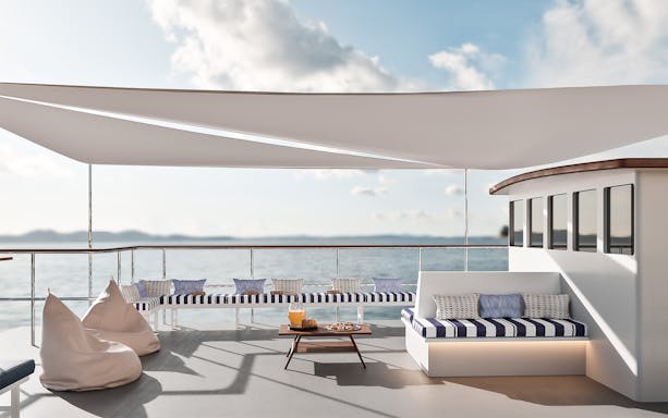 Luxurious seating area on a boat deck during Palma Bay tour.