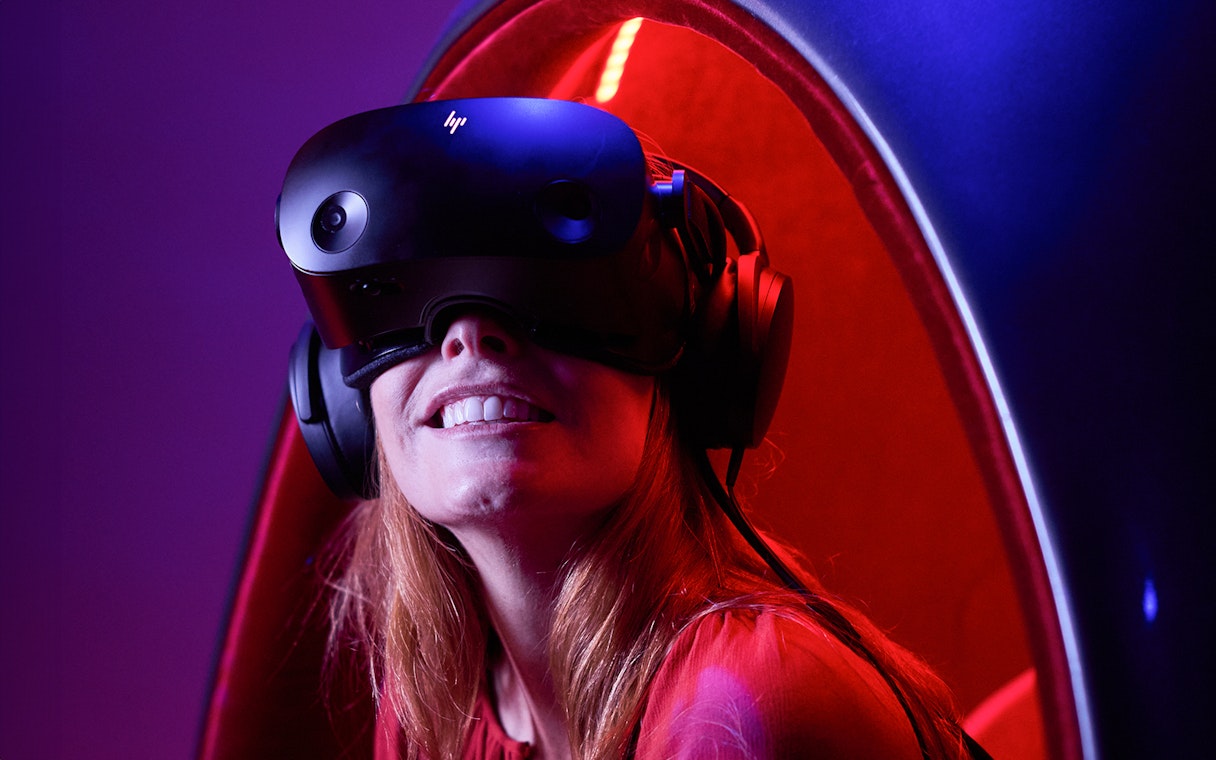 Person enjoying VR experience at Voyager Theatre.