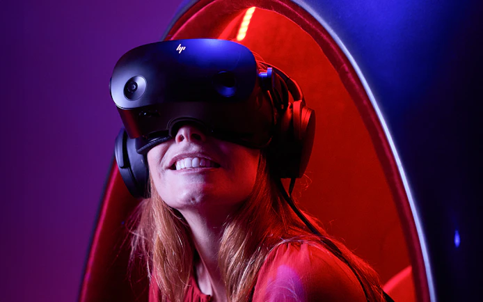 Person enjoying VR experience at Voyager Theatre.