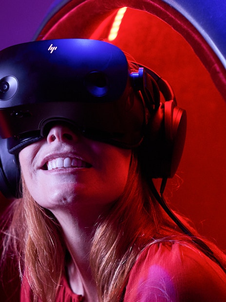 Person enjoying VR experience at Voyager Theatre.