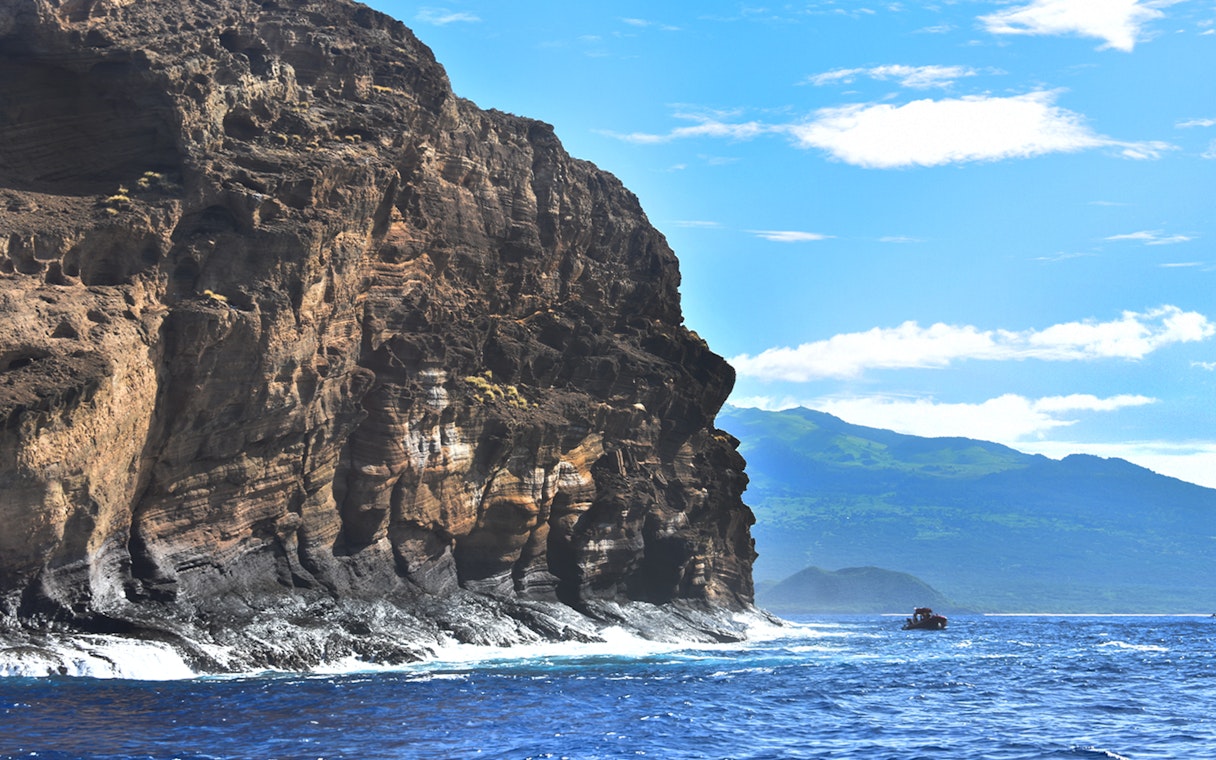Molokini Crater rock formation with ocean view, Island of Maui, Hawaii.