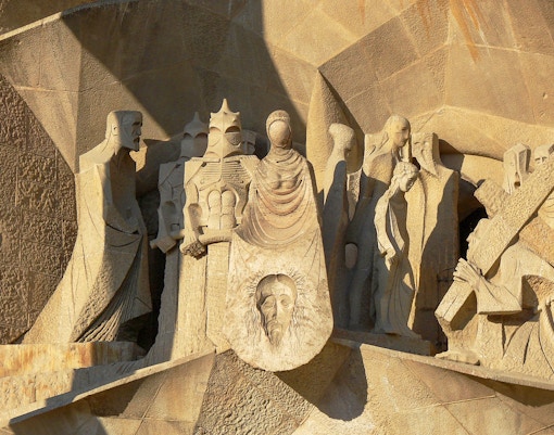 Sagrada Familia interior with intricate architectural details, Barcelona museum tour.