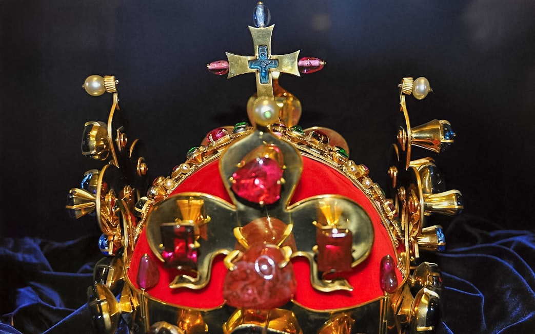 Crown adorned with jewels inside Karlstejn Castle.
